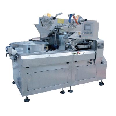 61-AUTOMATIC CANDY DISC SORTING AND PACKING MACHINE